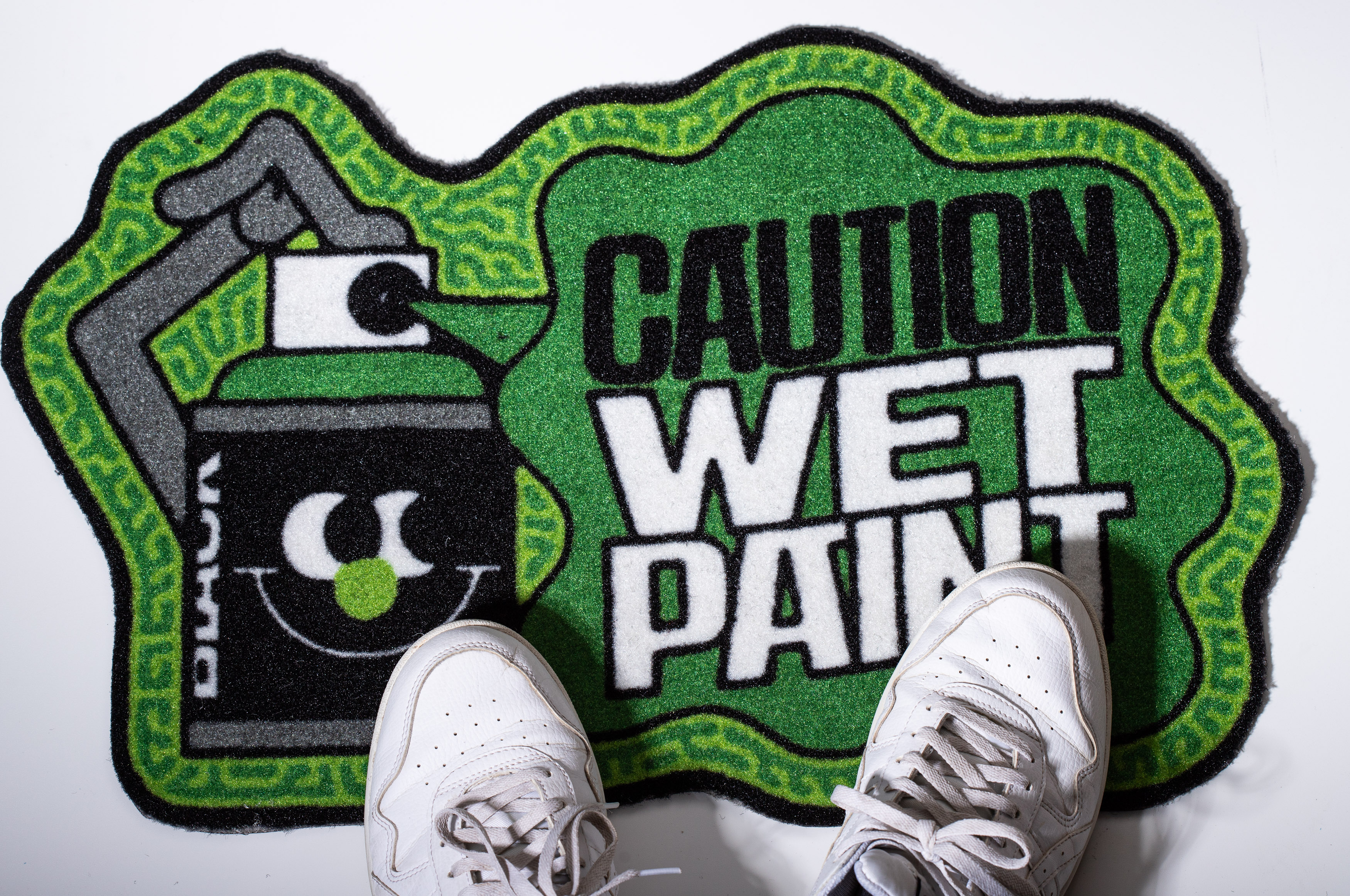 Montana Doormat Caution Wet Paint Green